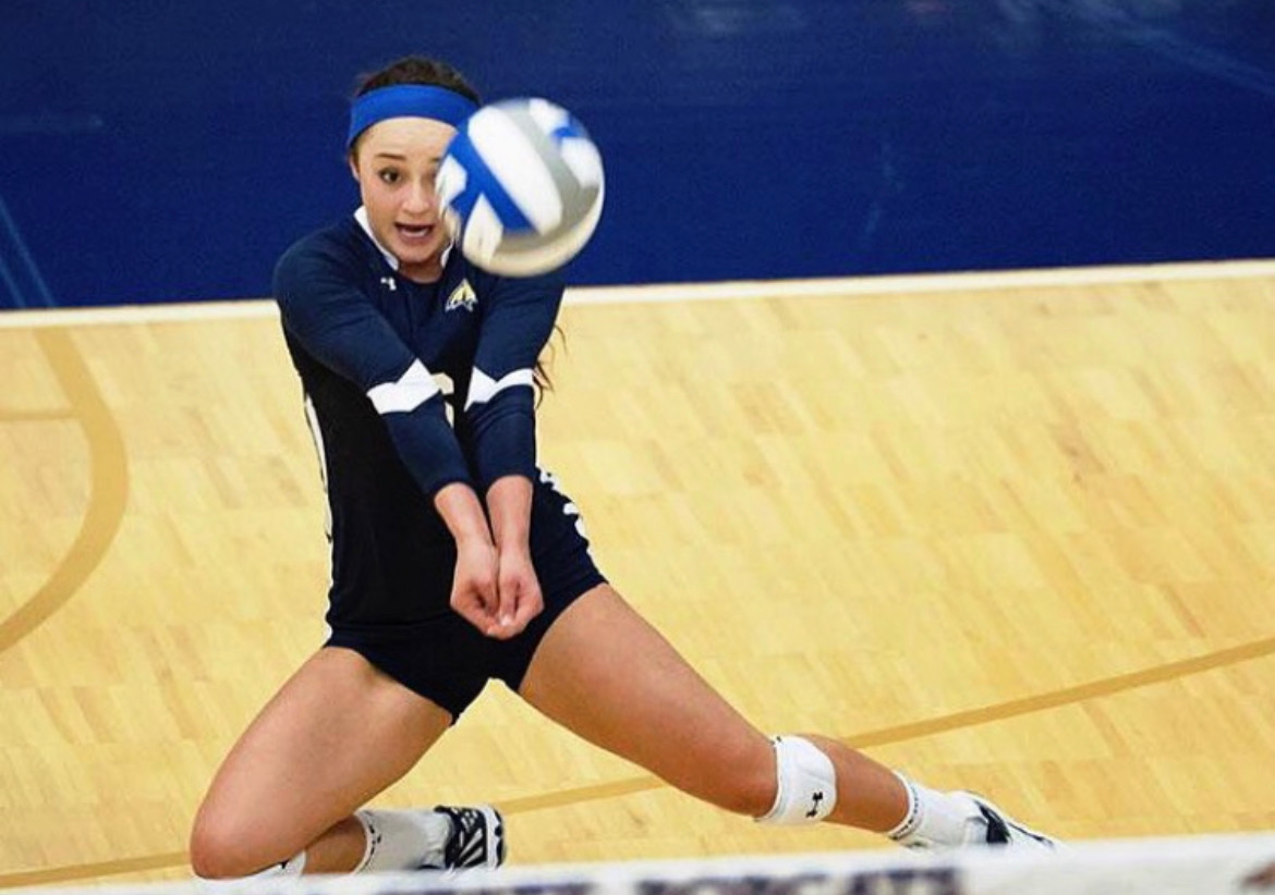Kasey playing collegiate volleyball